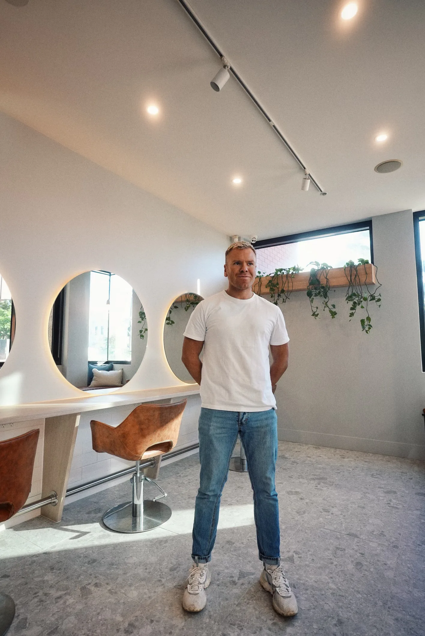 Inside Frankie Salon Richmond — arched mirrors and styling area