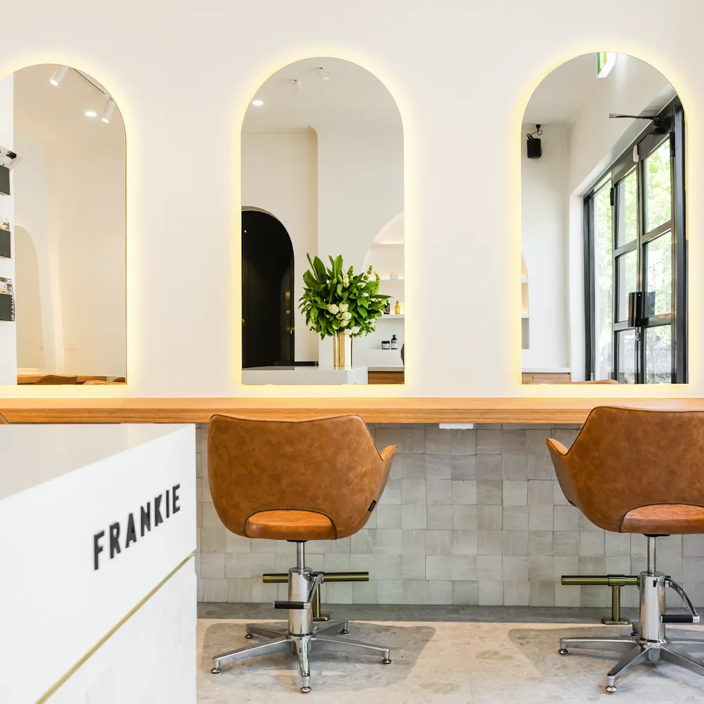 Frankie Salon South Yarra reception desk, arched alcoves and tiled floor